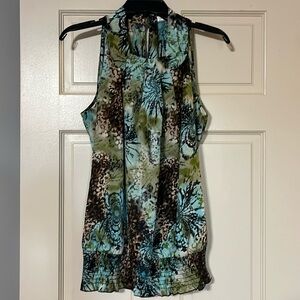 Very pretty sleeveless dress top Size L, Multi- Colors